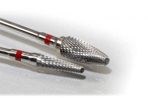 Two fine dental milling burs, each with a red ISO stripe